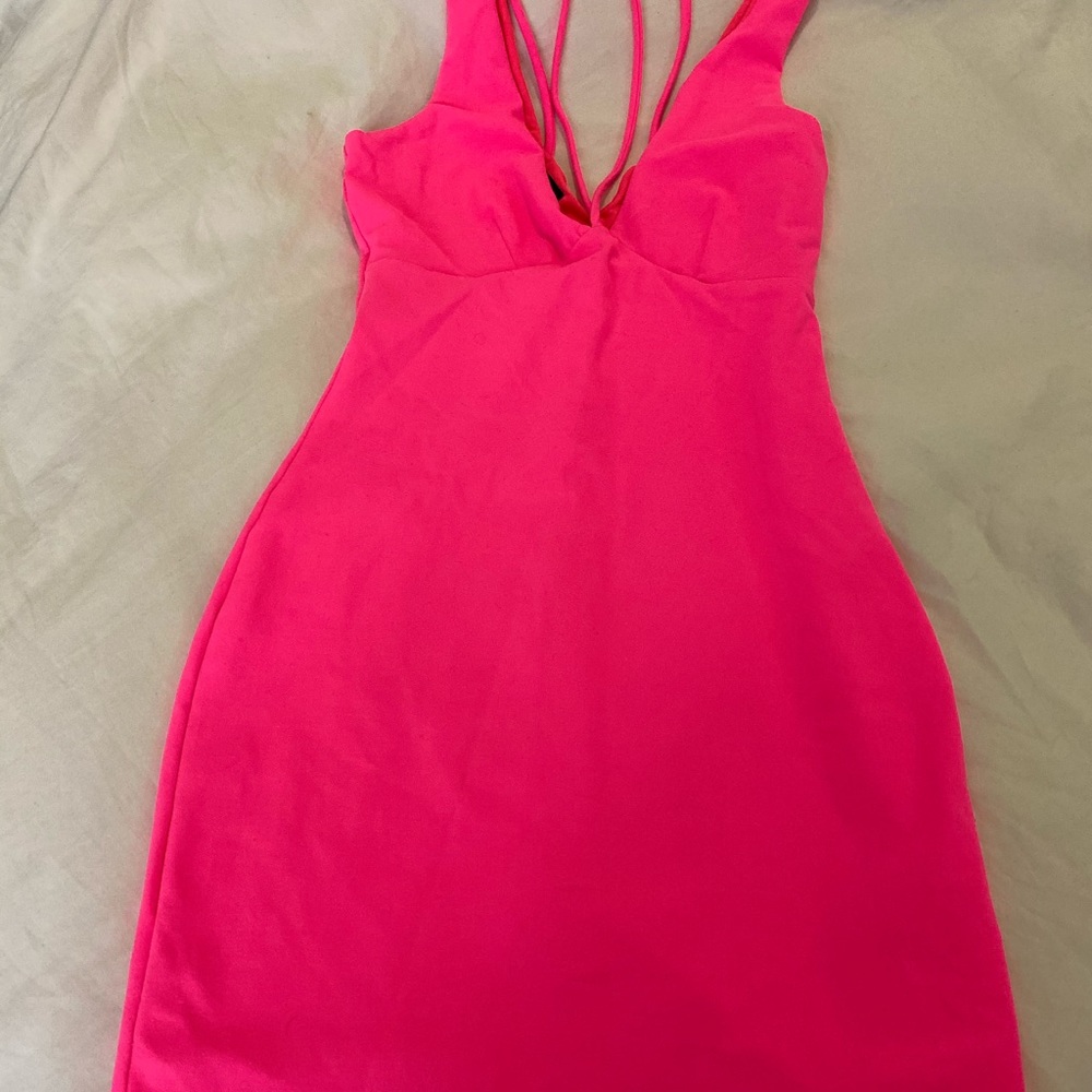 Tight neon Bebe dress